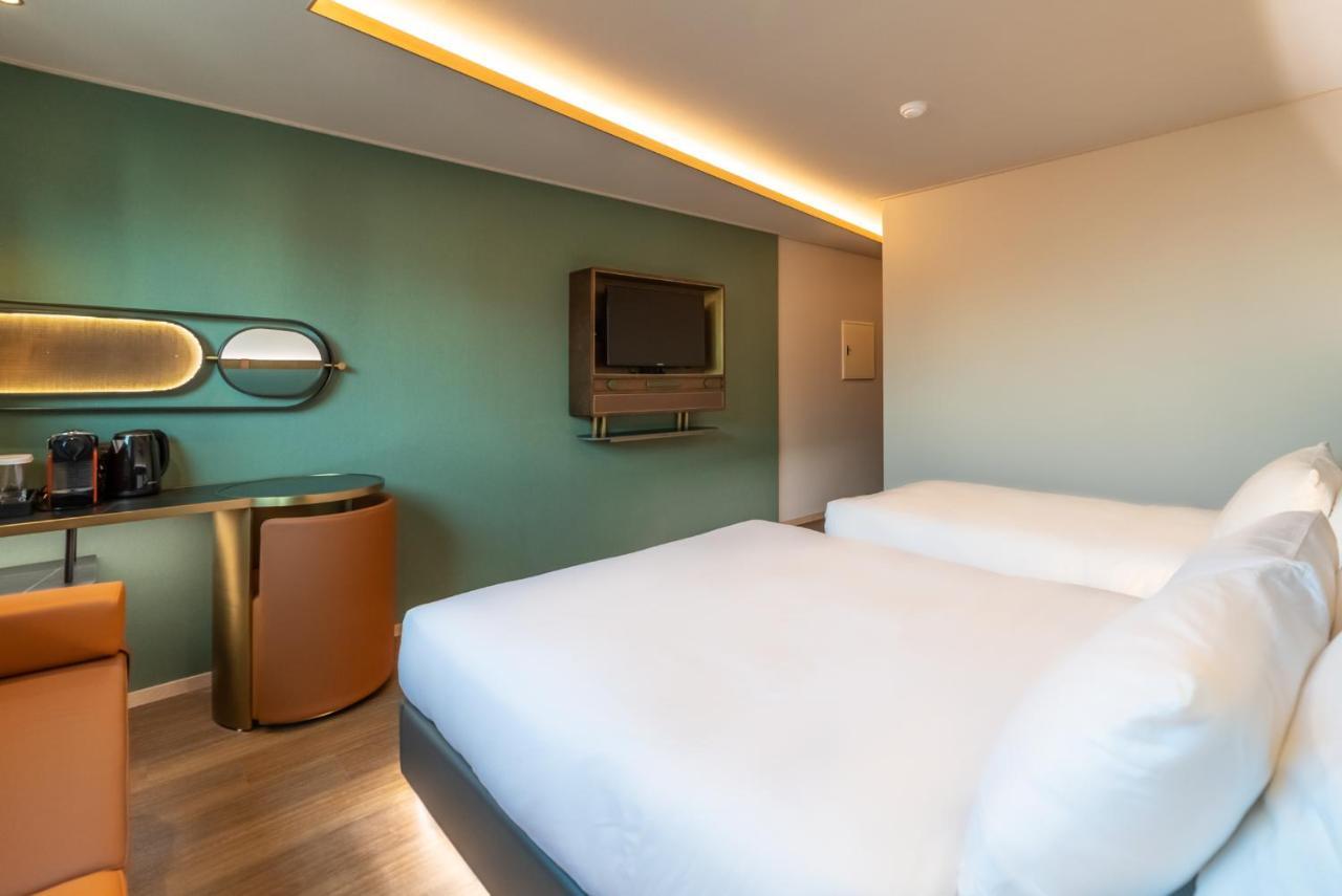 L&L Central Hotel Jeju Bagian luar foto